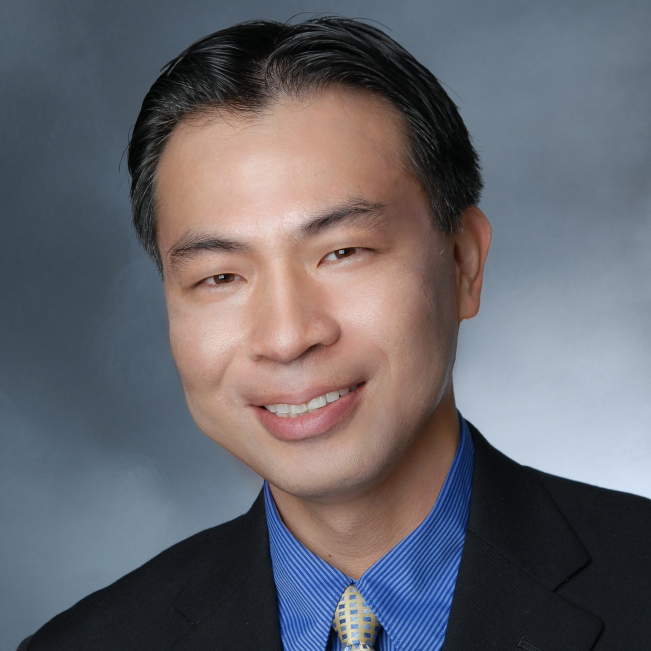 Headshot of Y. Tony Yang